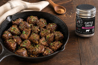 Garlic butter steak bites in a cast-iron skillet with Casa M Cattle Drive Beef Seasoning