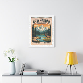 Large Rocky Mountain National Park canvas print above a white console in a modern room