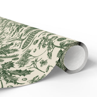 Close-up of Evergreen Botanical Toile wrapping paper roll showing pine sprigs, pinecones and holly pattern