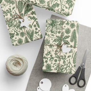 Gifts wrapped in Artisan Grove Evergreen Botanical Toile wrapping paper with twine and white gift tags