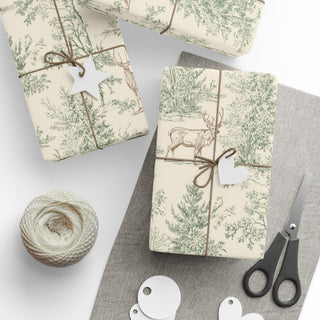 Rustic gifts wrapped in woodland deer and pine tree toile paper with twine and white gift tags