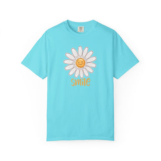 Comfort Colors® Sunshine Daisy Smile T-shirt available in vibrant blue featuring a smiling daisy floral graphic by Artisan Grove.
