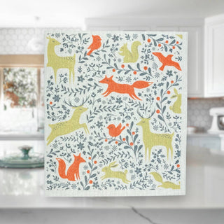 Reusable Forest Animals Swedish Dishcloth displayed in a bright cottage-style kitchen
