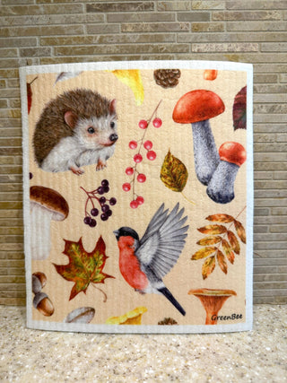 Reusable hedgehog and bird Swedish dishcloth displayed on a kitchen counter