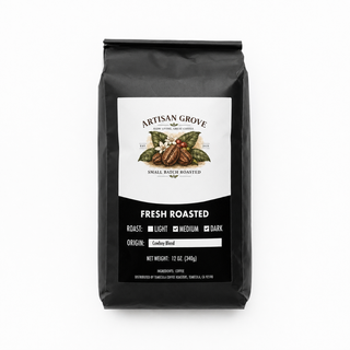 Artisan Grove Cowboy Blend Coffee in a matte black bag with a vintage cream label and antique bronze accent.